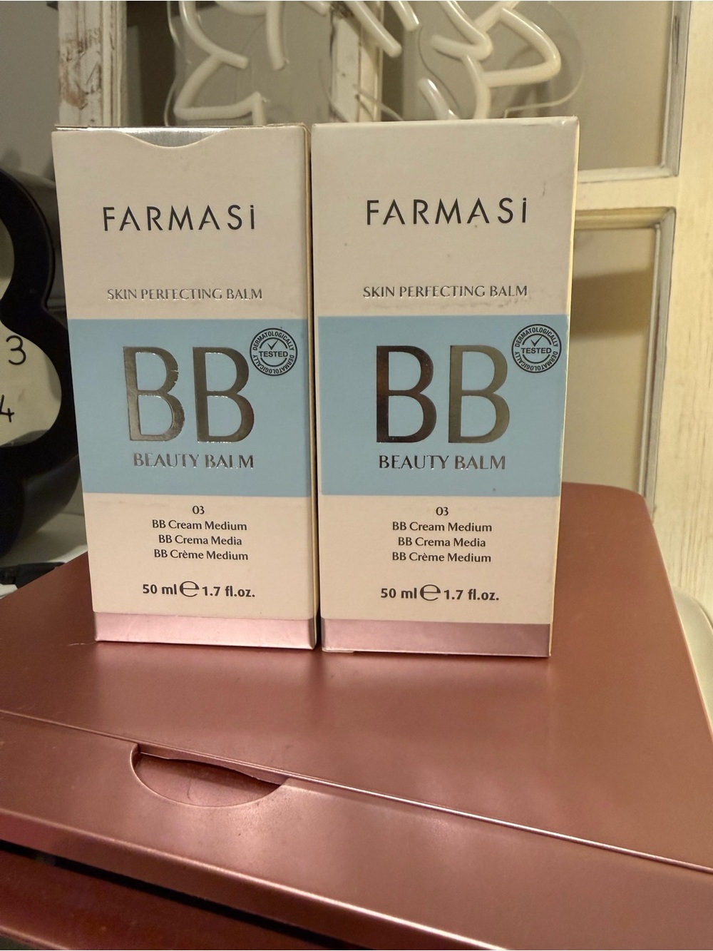 Farmasi BB Beauty Balm Cream Medium in Light Pink and Light Blue Packaging